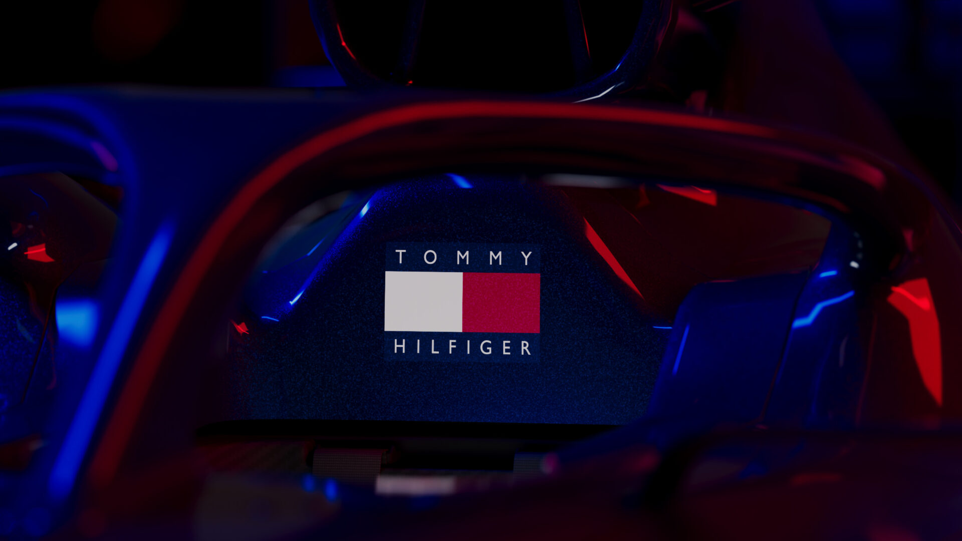 The Tommy Hilfiger logo positioned on the seat of a Cadillac F1 racing car
